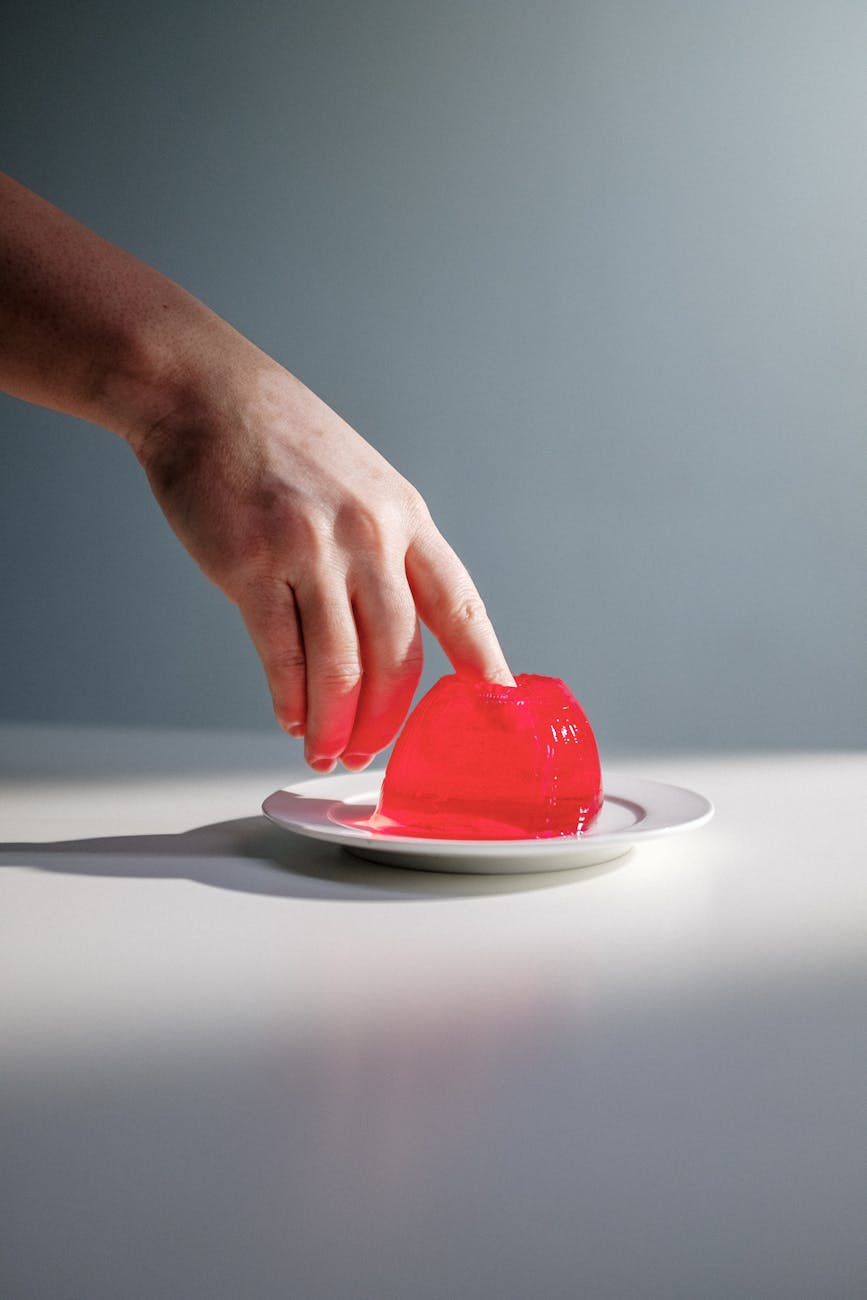 a person s finger inside a gelatin